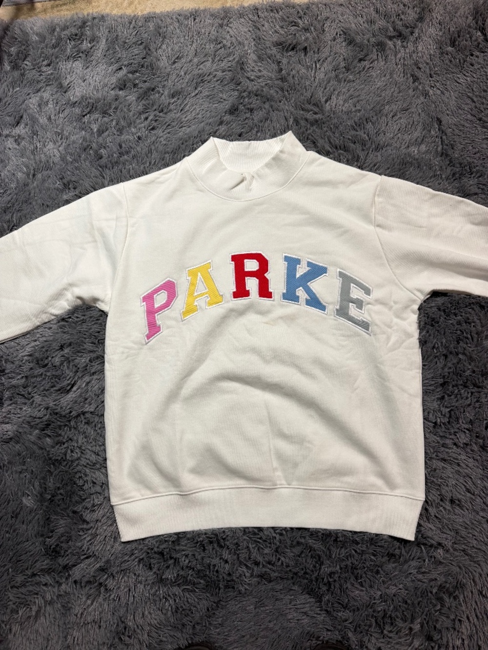 White Parke Varsity Mockneck Sweatshirt featuring multicolor Sumerland in L/XL